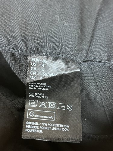 Široké kalhoty H&M 77 % polyester 23 % viskoza