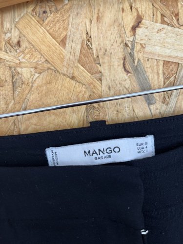 Elastické kalhoty Mango s podílem bavlny a elastanu
