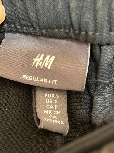 Teplákové kalhoty H&M 68 % polyester